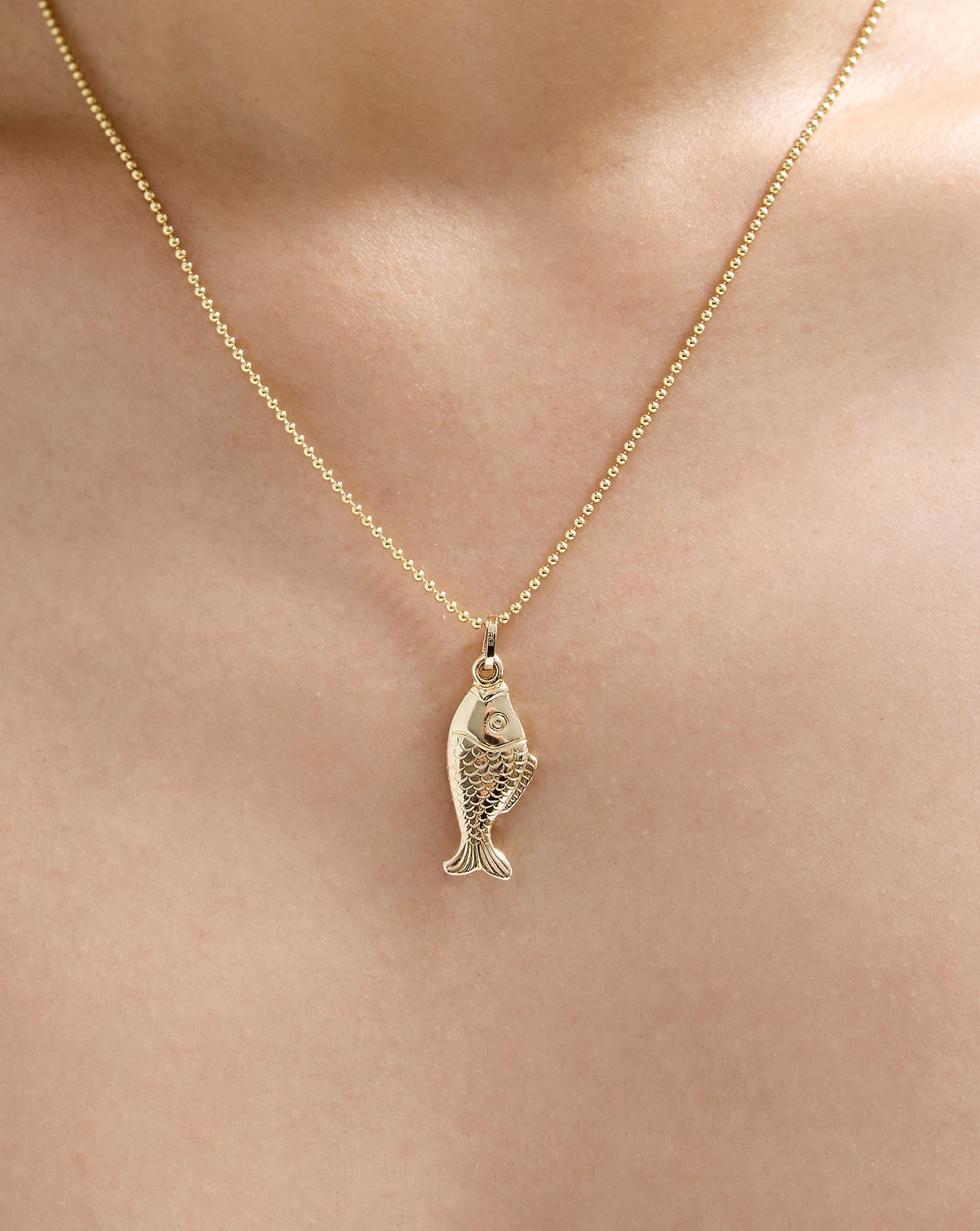 Golden Catch Pendant