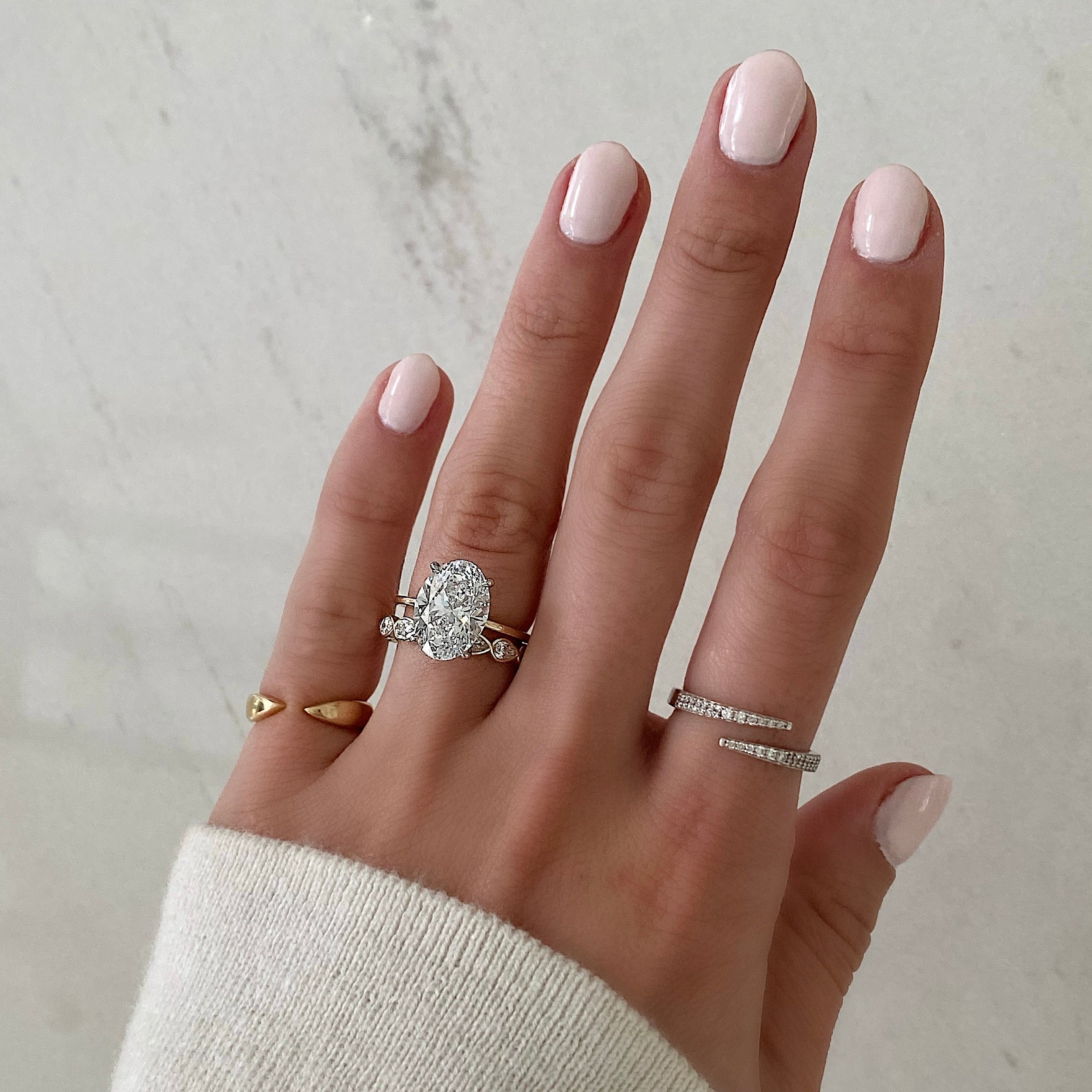 Sideways Pear Bezel Eternity Band